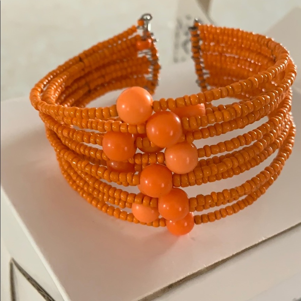 Orange bracelet.